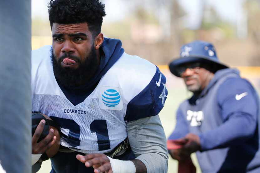 Dallas Cowboys running back Ezekiel Elliott (21) works out with Dallas Cowboys running backs...