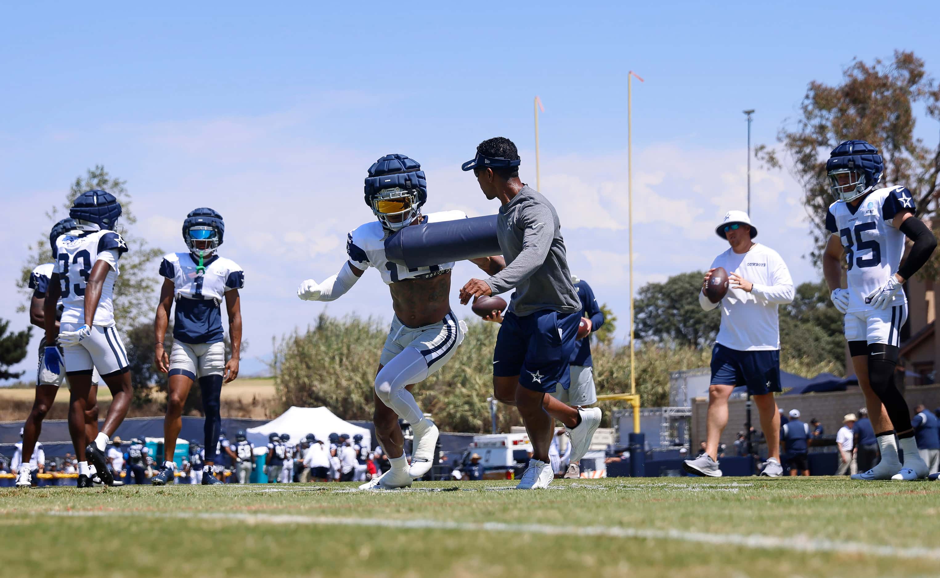Dallas Cowboys wide receiver Tyron Billy-Johnson (13) runs pass route drills with blocking...