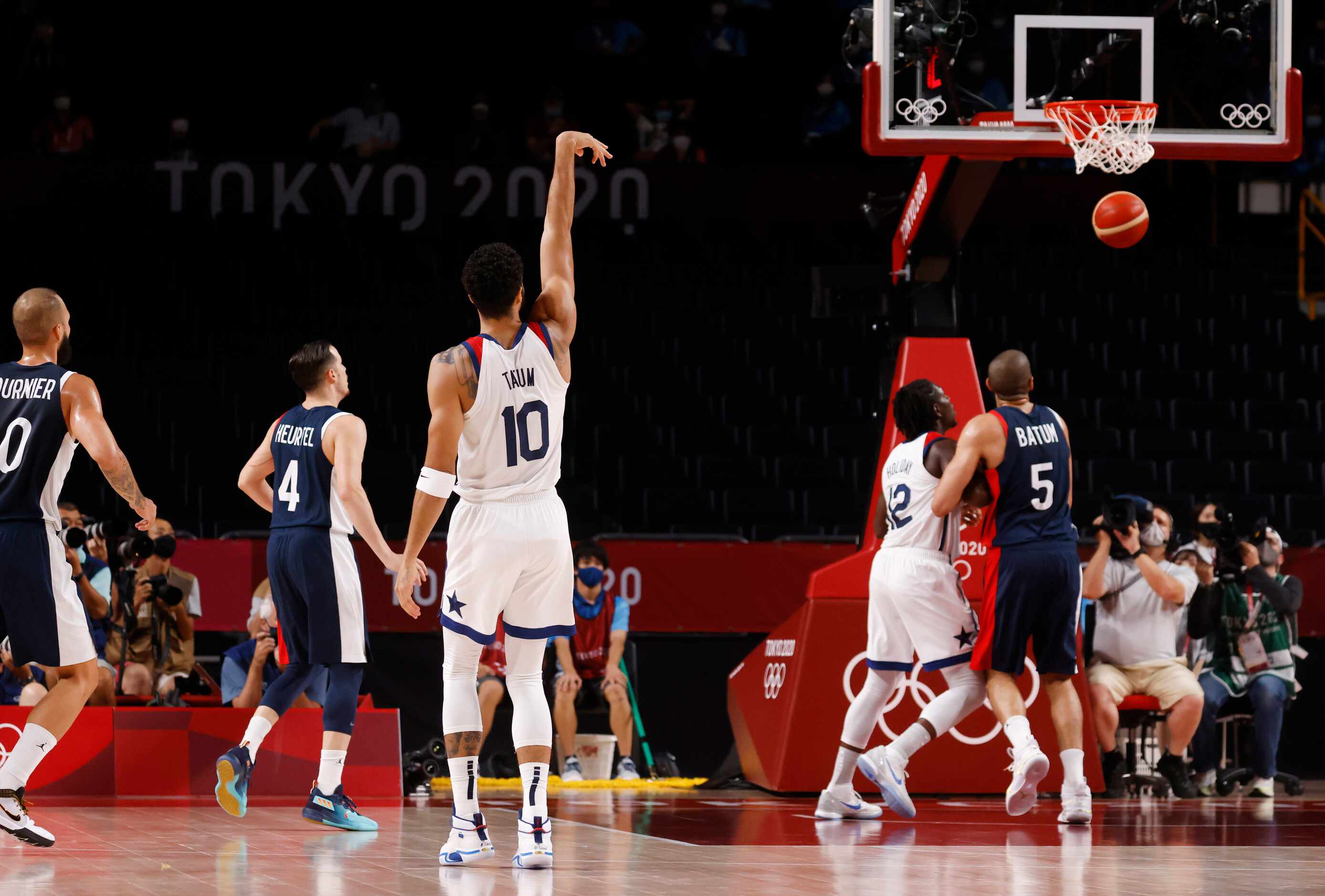 USA’s Jayson Tatum (10) hits a three pointer in a game against France during the second half...