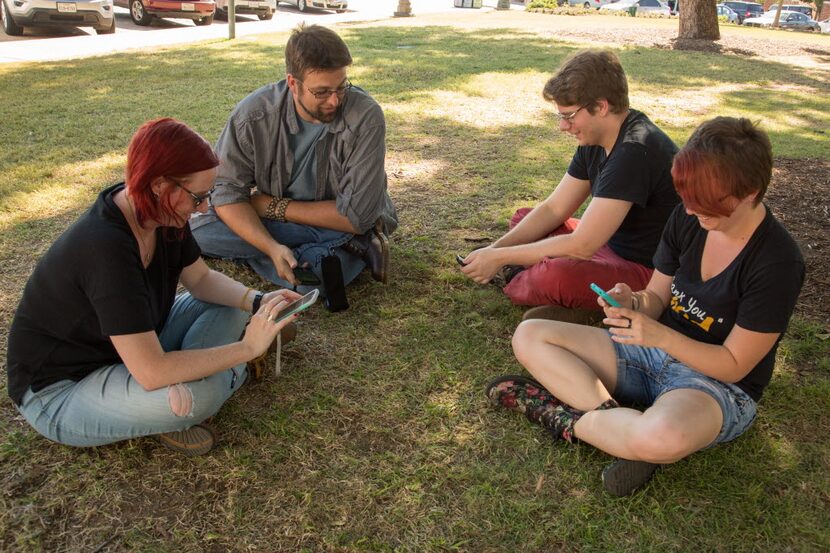 From left to right, Brooke Brei, Austin Brei, Ben Davidson, and Sarah White, play Pokemon Go...