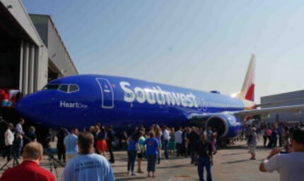  Employees and visitors check out Southwest Airlines' new look on Sept. 8, 2014, at Dallas...