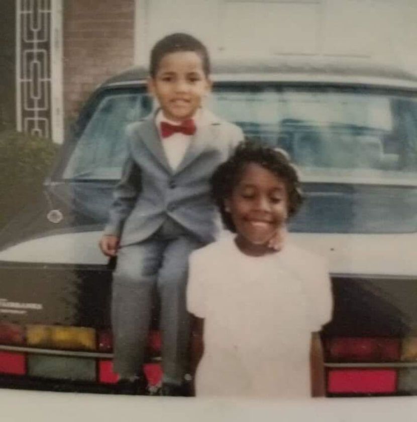 Kendra Curlin and her younger brother Edward Wilson pose by a car as children. Wilson was...