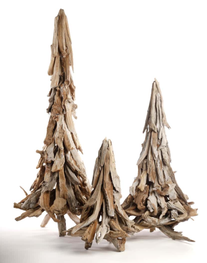 O Tannenbaum: Stylized Christmas trees are handmade from authentic barn wood. Each piece is...