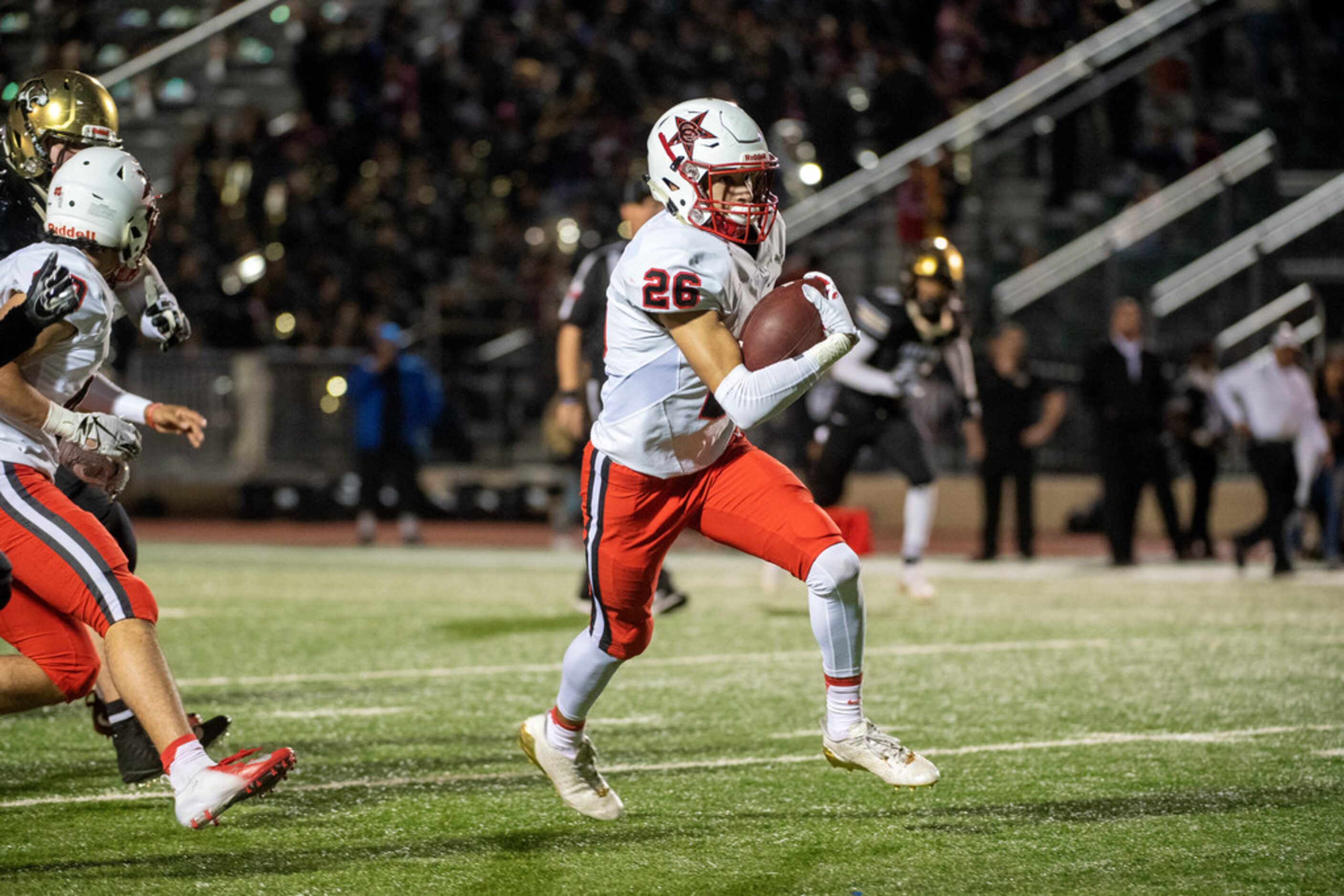 Coppell senior defensive back Noah Snelson (26) turns upfield after recovering a fumble that...