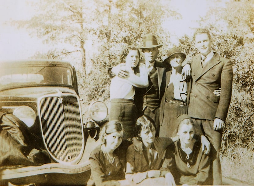 A Barrow family gathering in West Dallas in the Trinity River bottom. Clyde Barrow is second...