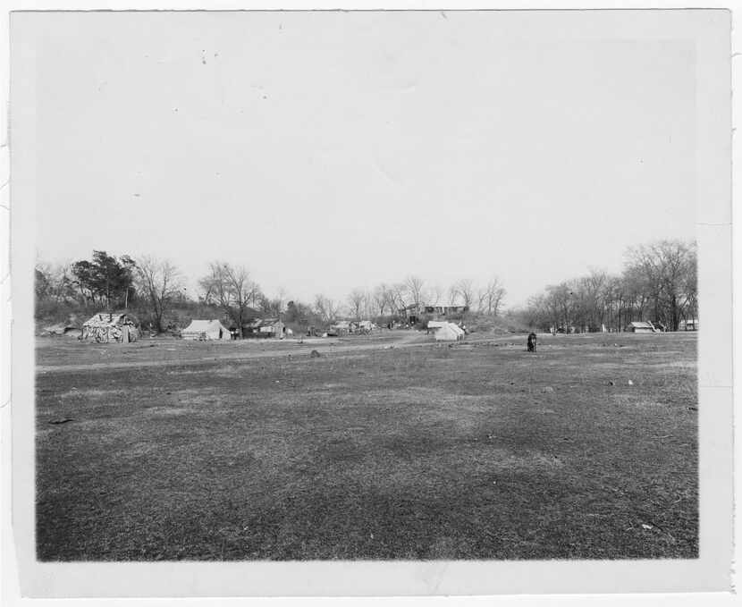 Photograph of Woodchuck Hill’s hovels, 1910. Courtesy of Dallas Municipal Archives, provided...