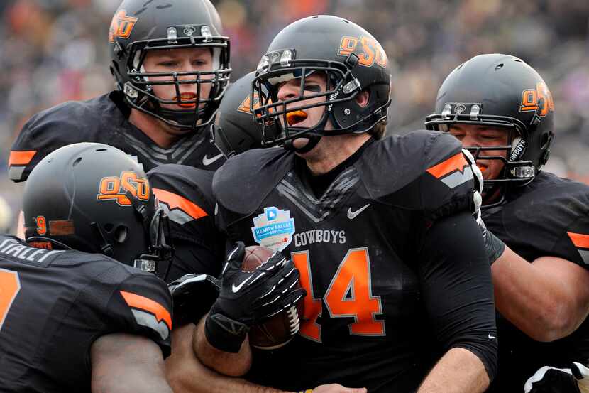 FIVE KEY QUESTIONS FOR OKLAHOMA STATE'S 2013 SEASON: It wasn't too long ago that an 8-5...