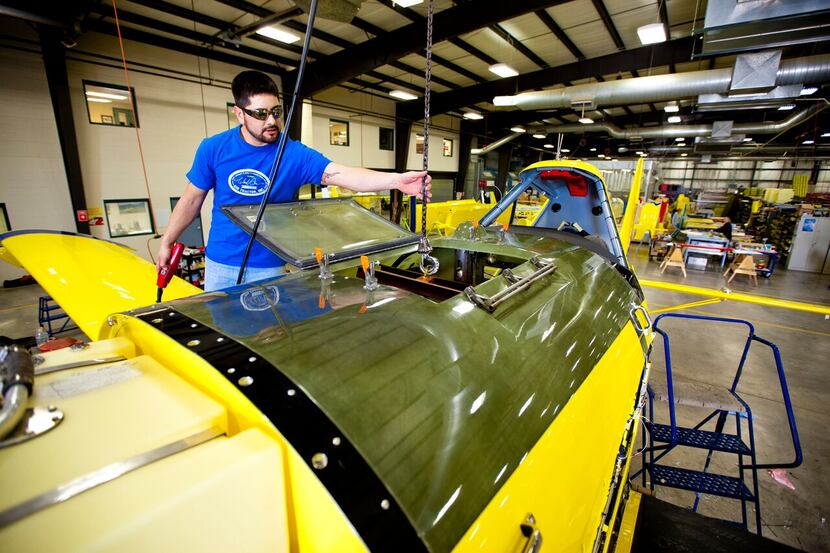 A employee at Olney-based Air Tractor works on one of its planes. The company uses the...