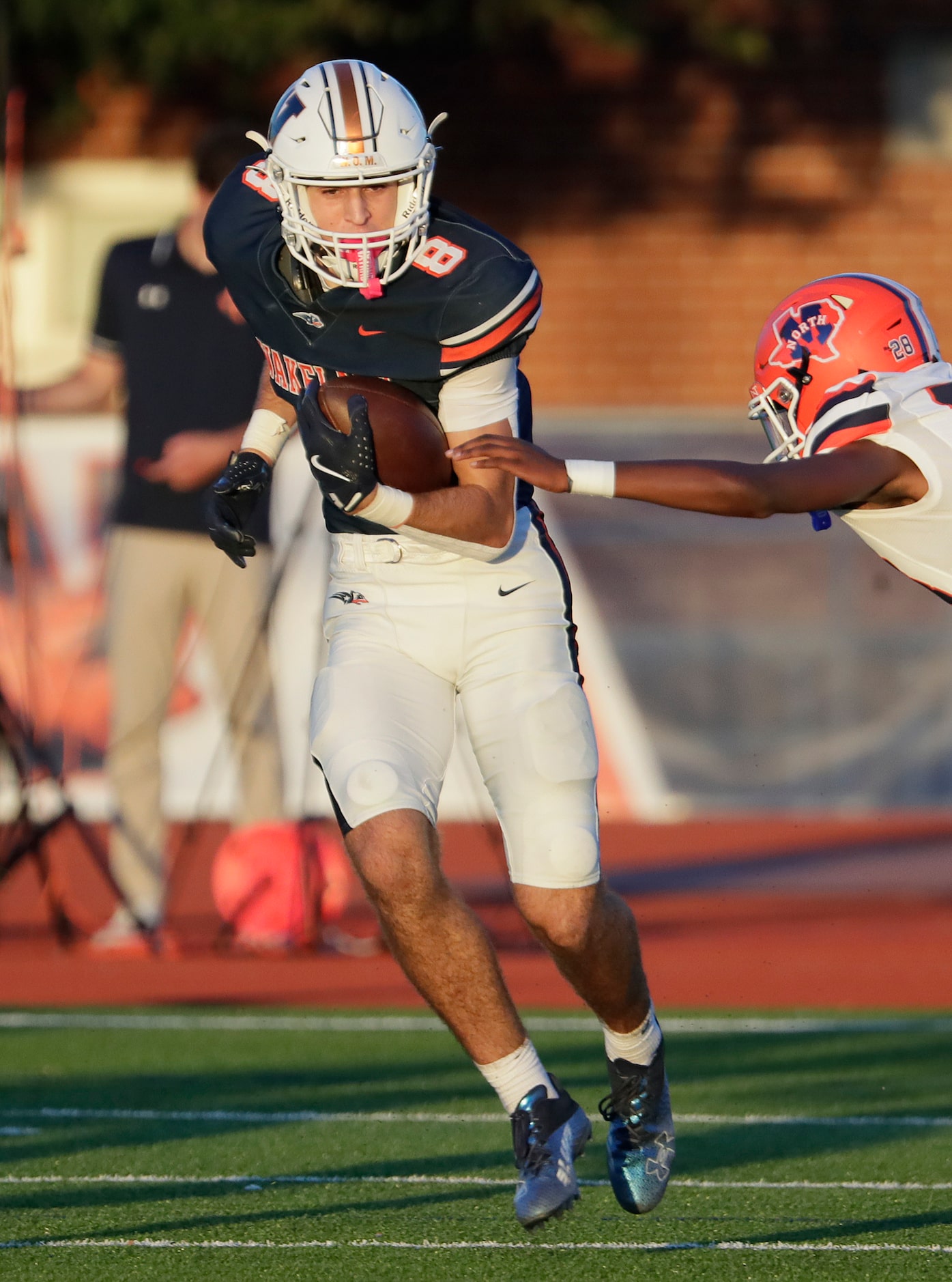 Wakeland High School wide receiver Ryder Treadway (8) makes a reception during the first...