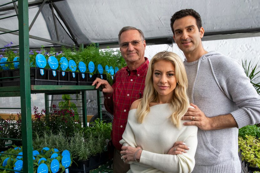 Owner Jon Pinkus (left) and his son Aaron (right) and daughter-in-law Pamela posed for a...