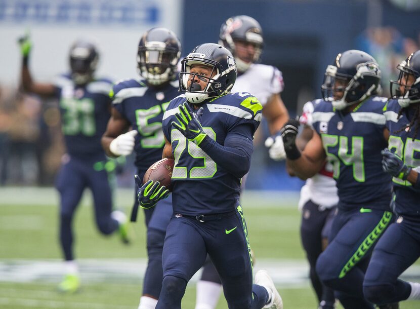 Seattle Seahawks free safety Earl Thomas (29) intercepts a Houston Texans quarterback...