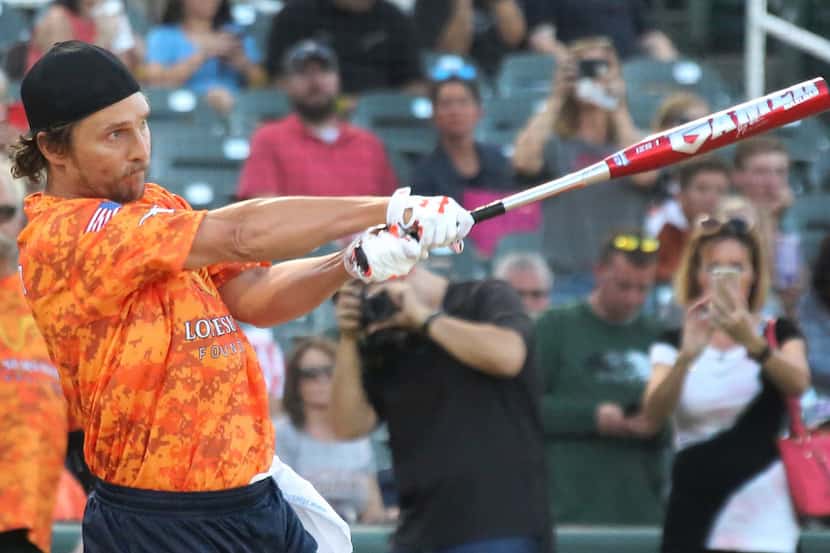 Actor Matthew McConaughey takes some swings during the Red River celebrity softball game...