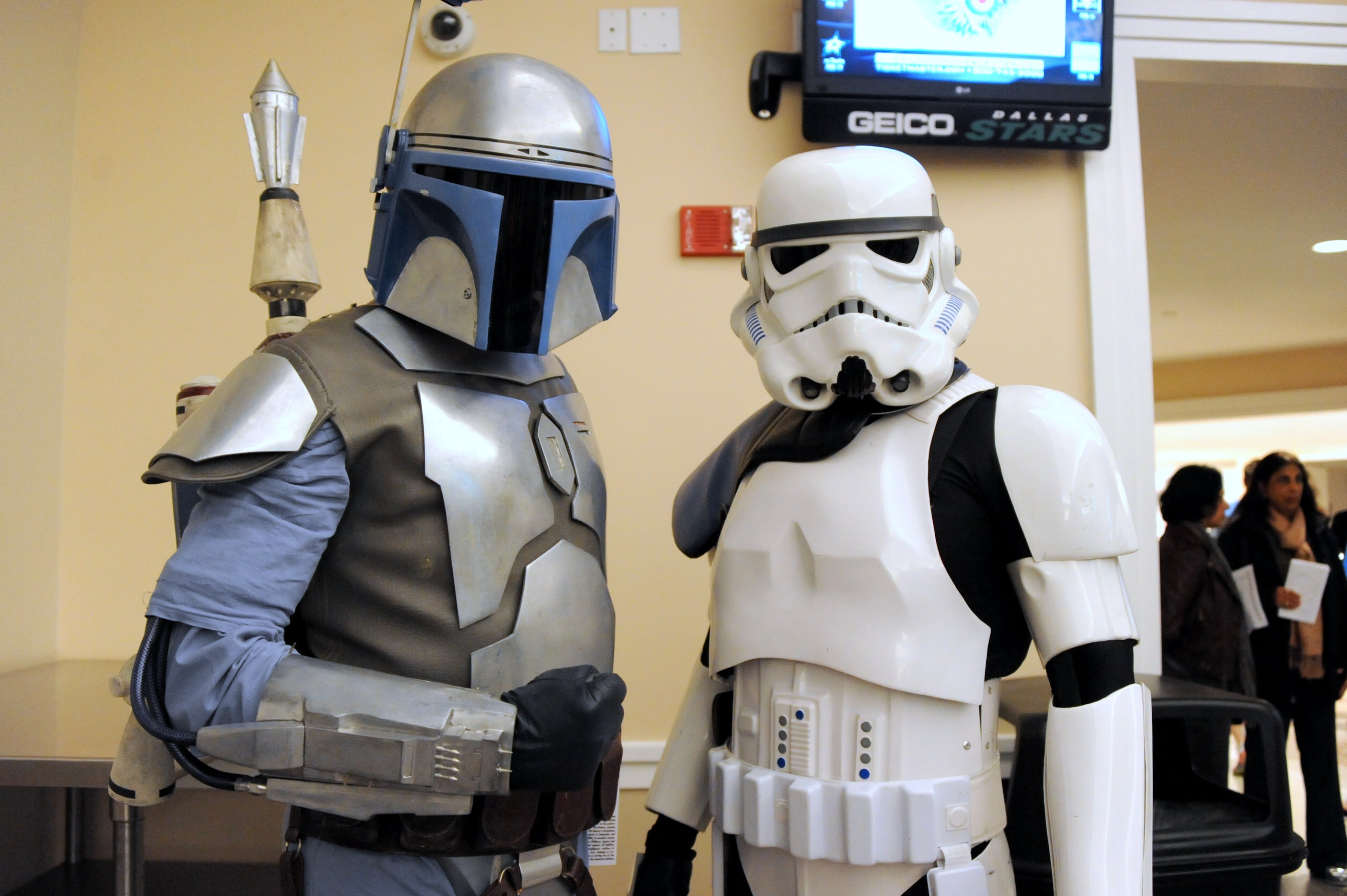 Jango Fett and a storm trooper meets fans at Star Wars night at the Dallas Mavericks...