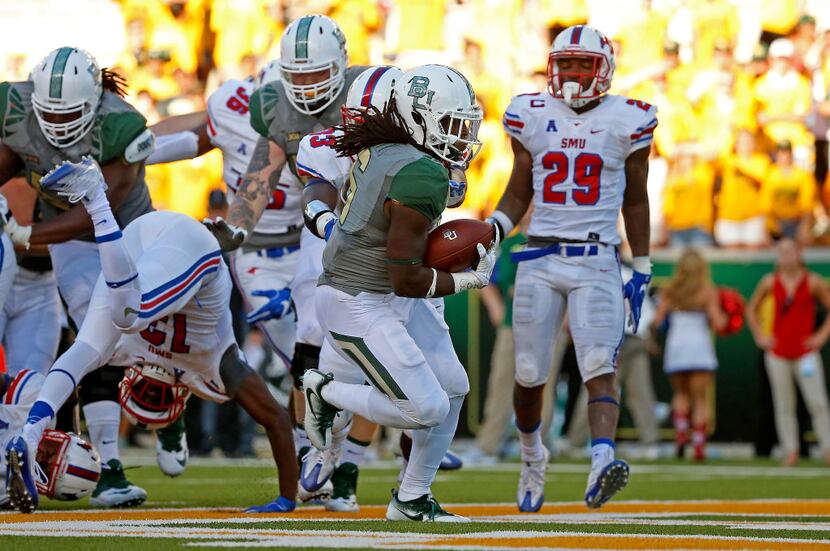 Baylor running back JaMycal Hasty (6) scores a touchdown against SMU during the fourth...