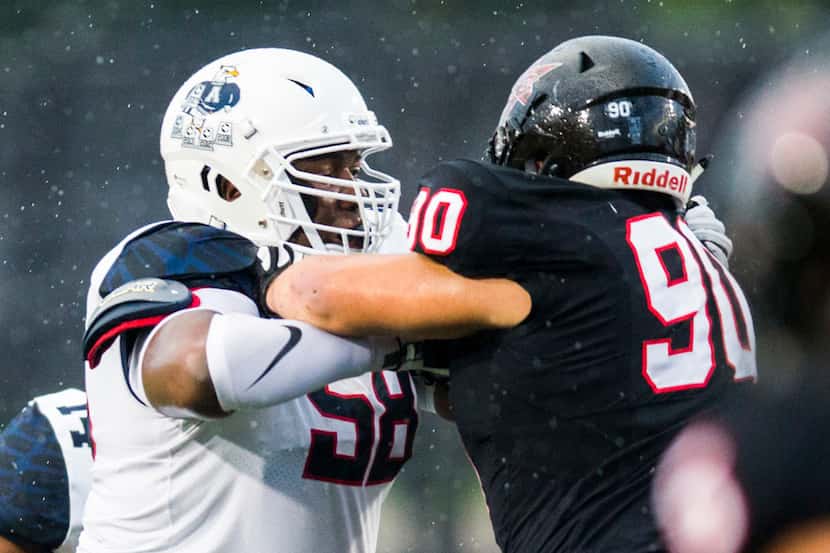 Allen offensive lineman CerTaidrian Brooks (58) squares up with Coppell defensive lineman...