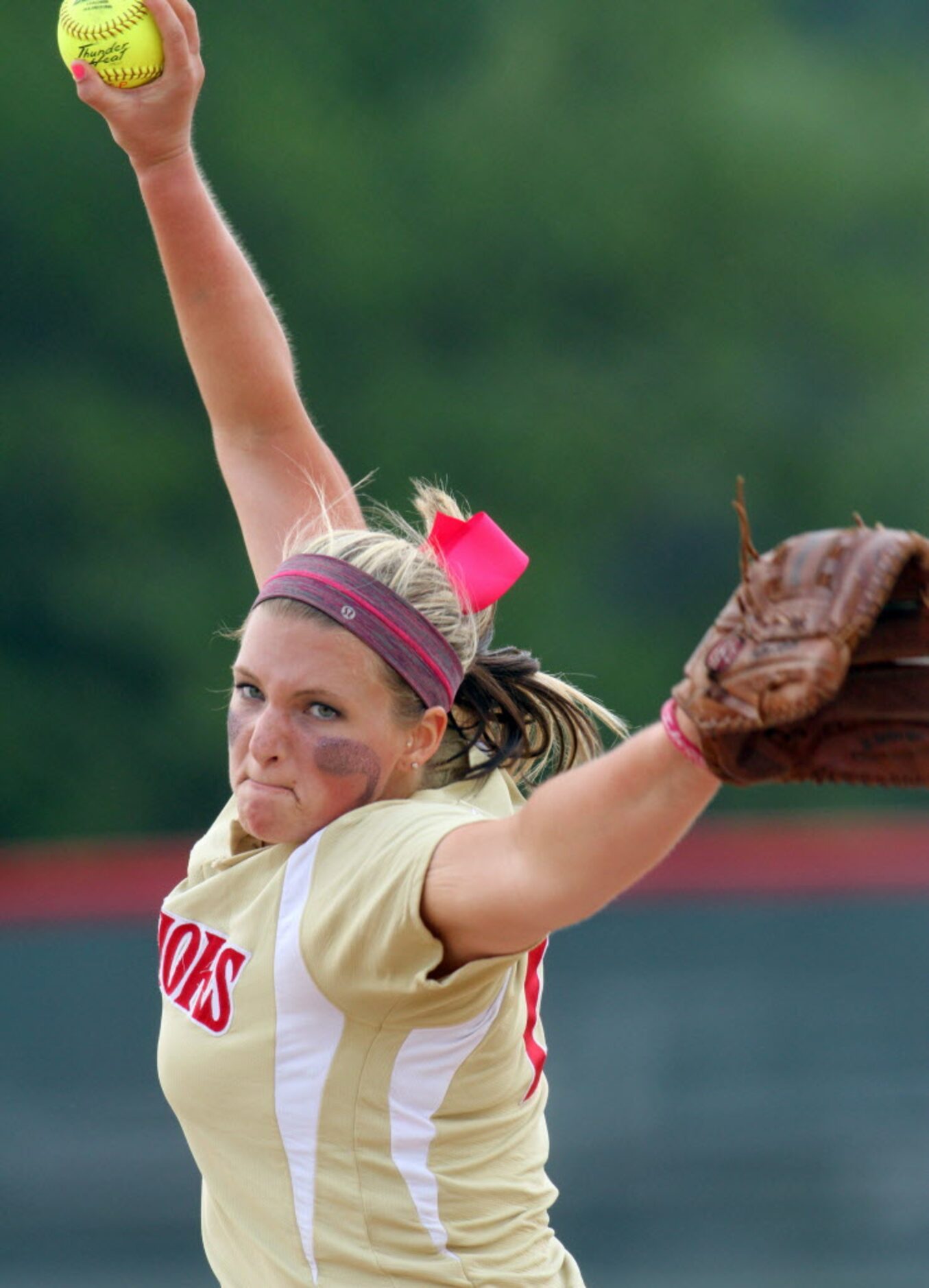 South Grand Prairie pitcher Haltom Shepherd (21) delivers a pitch to a Denton Guyer batter...