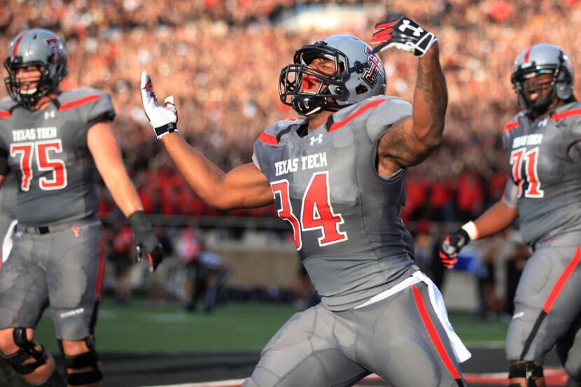 Texas Tech's Kenny Williams celebrates a touchdown against TCU during their NCAA college...