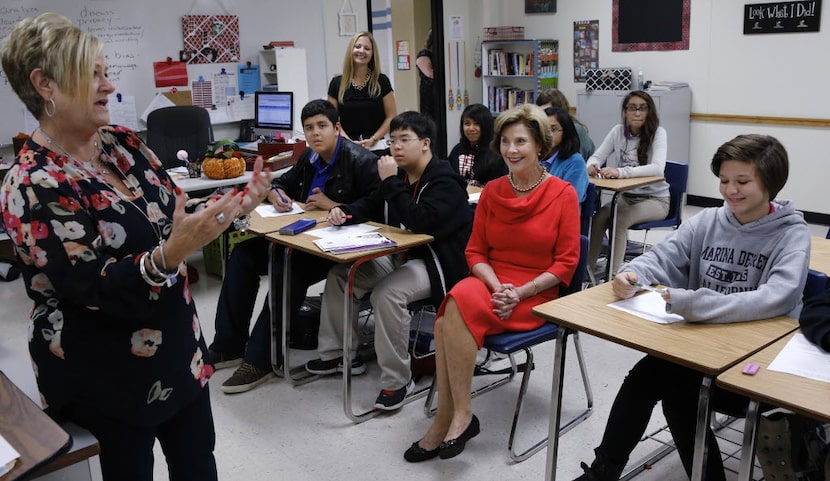 Former first lady Laura Bush attends an English Gifted and Talented class with 8th graders...