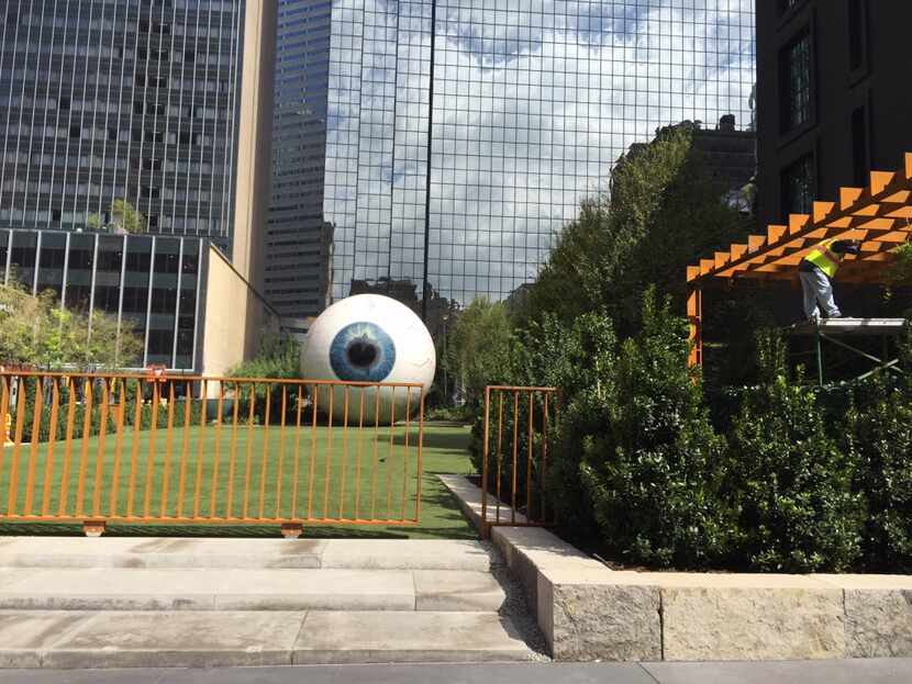 AFTER: Eye, by Chicago-based artist Tony Tasset, is a 30-foot tall, three-dimensional...