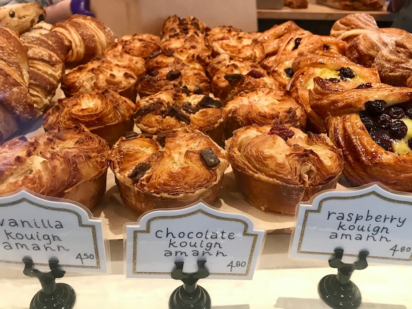 Kouign-amann is a flaky French pastry made with laminated dough. Village Baking Co. sells...