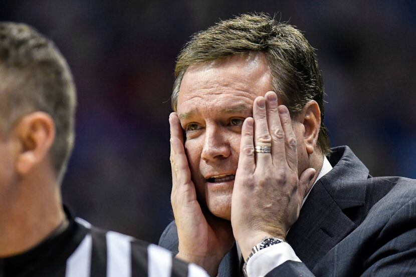 Kansas Jayhawks head coach Bill Self reacting during the first half of an NCAA college...