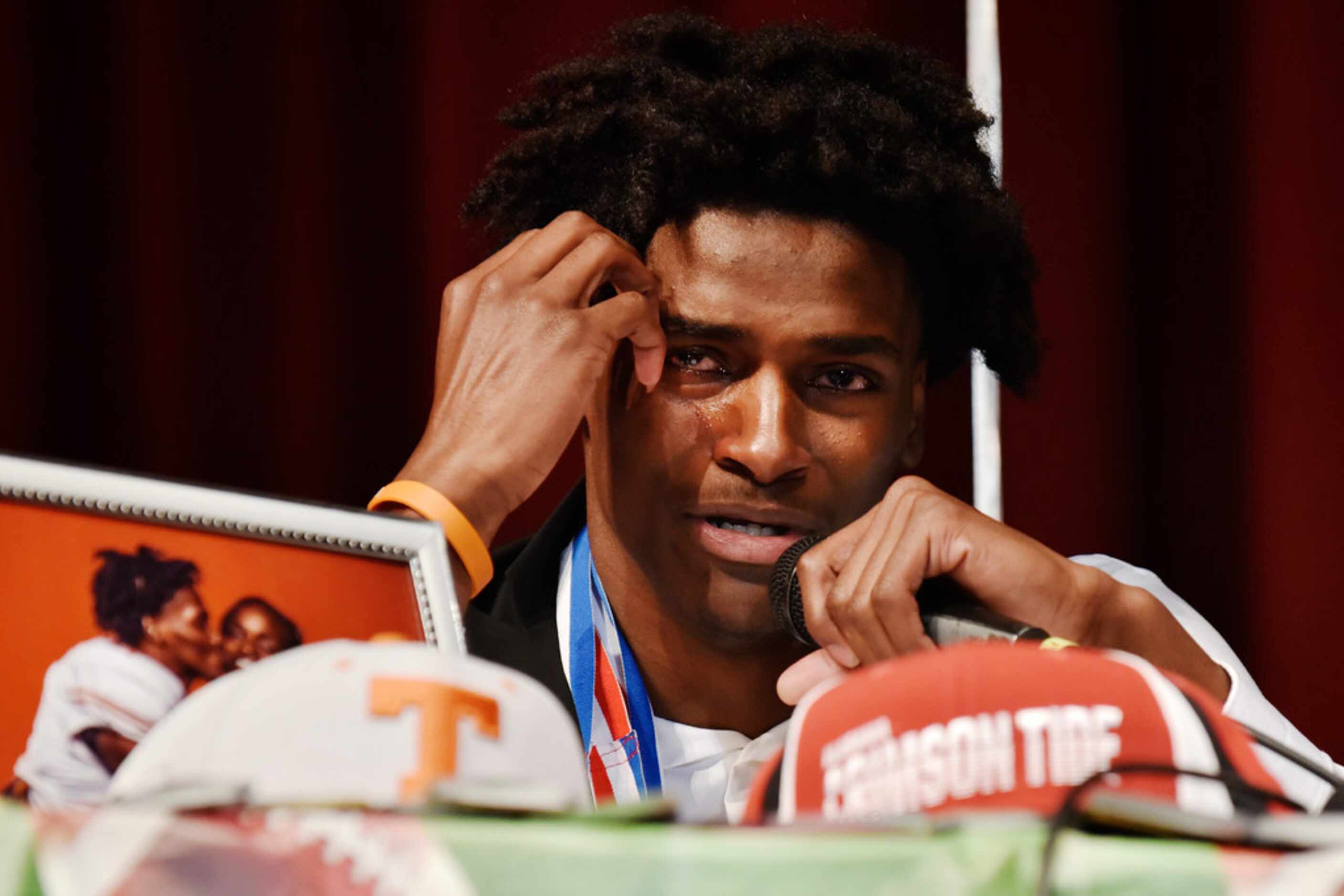 Duncanville cornerback Ennis Rakestraw, Jr., begins to cry as he speaks about his family and...