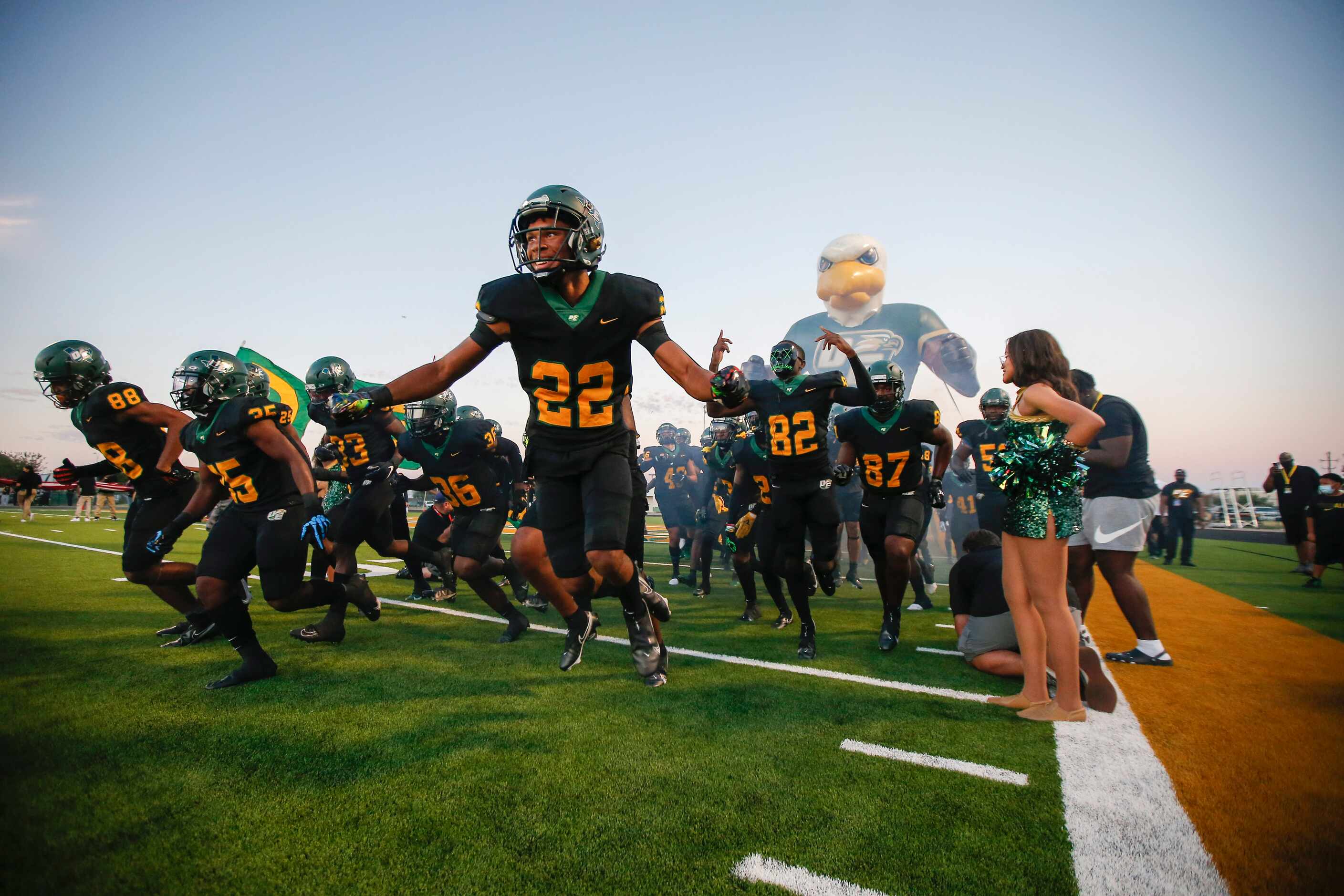 DeSoto junior defensive back Jamarion Ravenell (22) and his teammates take the field for the...