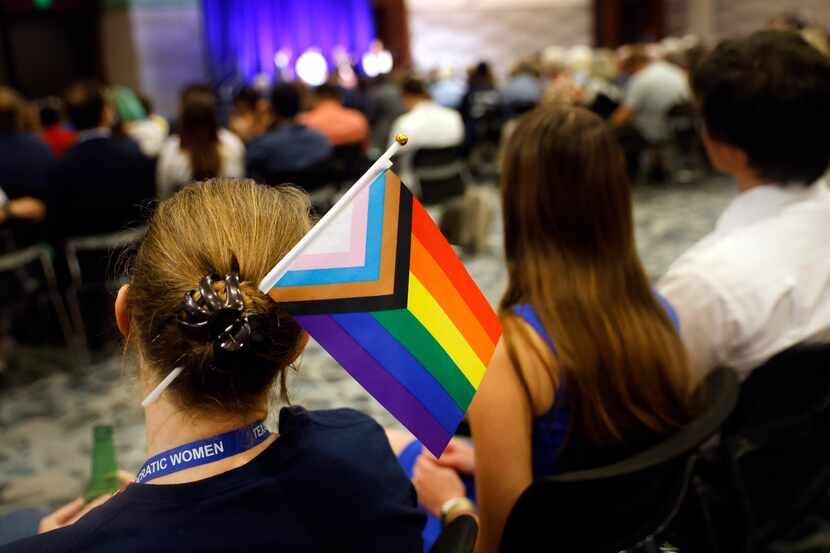 A woman supporting the LGBTQ community wore a flag in her hair during the kick-off reception...