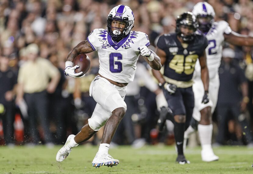 WEST LAFAYETTE, IN - SEPTEMBER 14: Darius Anderson #6 of the TCU Horned Frogs breaks a run...