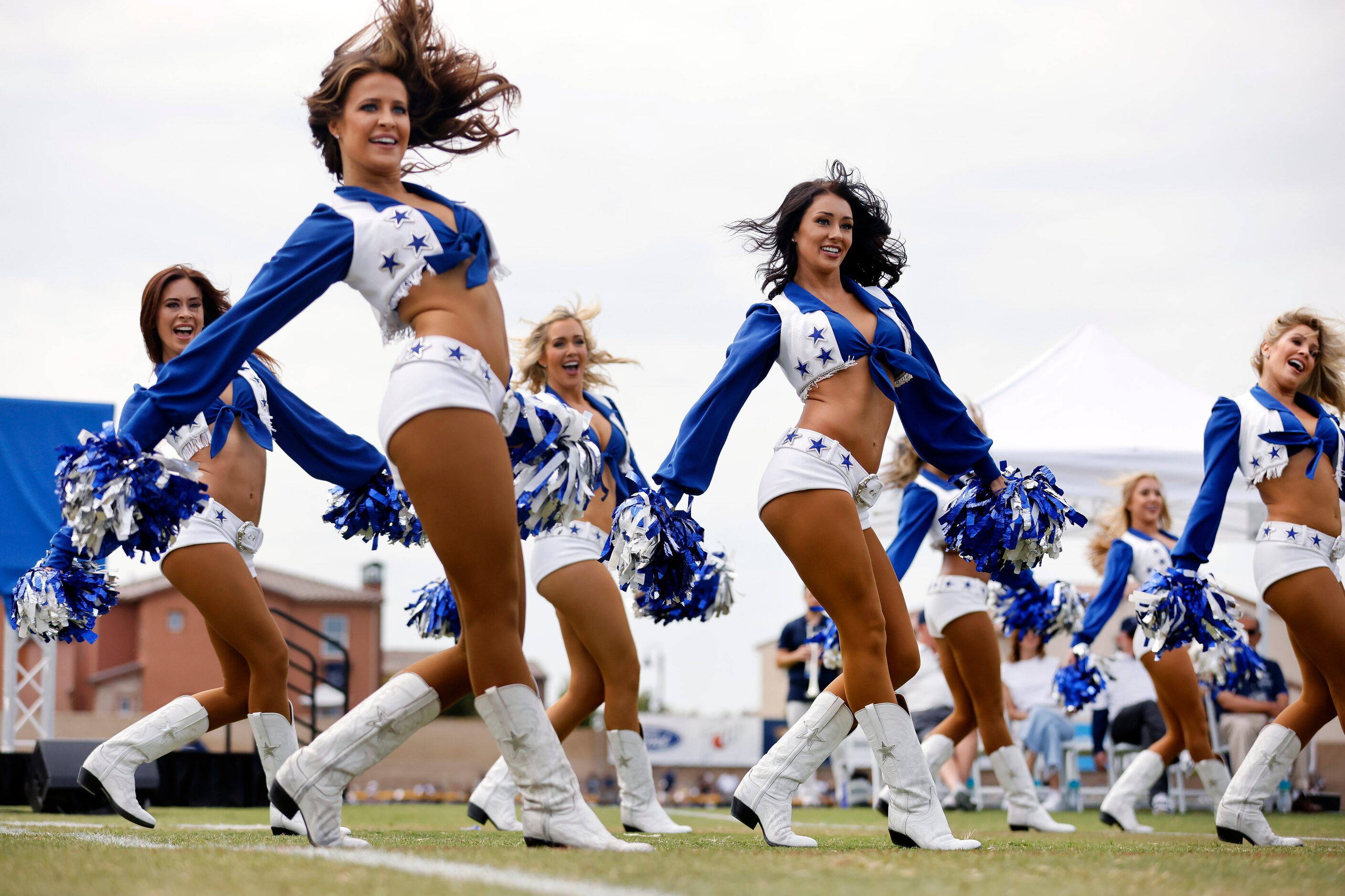 The Dallas Cowboys Cheerleaders perform during the Cowboys training camp opening ceremonies...