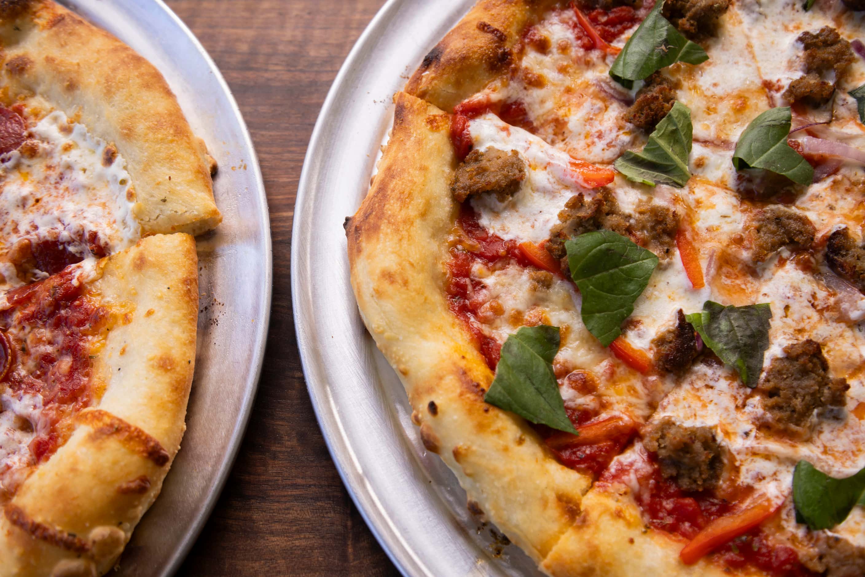 The Meatball Pizza (right) served at the Wriggly Tin, a new bar near Fair Park, in Dallas on...