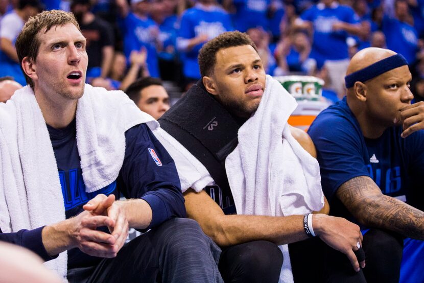 Dallas Mavericks forward Dirk Nowitzki (41), guard Justin Anderson (1) and forward Charlie...