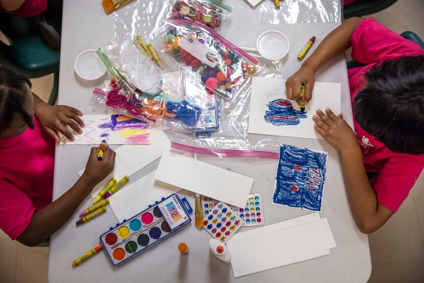Children enjoy arts and crafts activities at Vogel Alcove, which provides an array of...