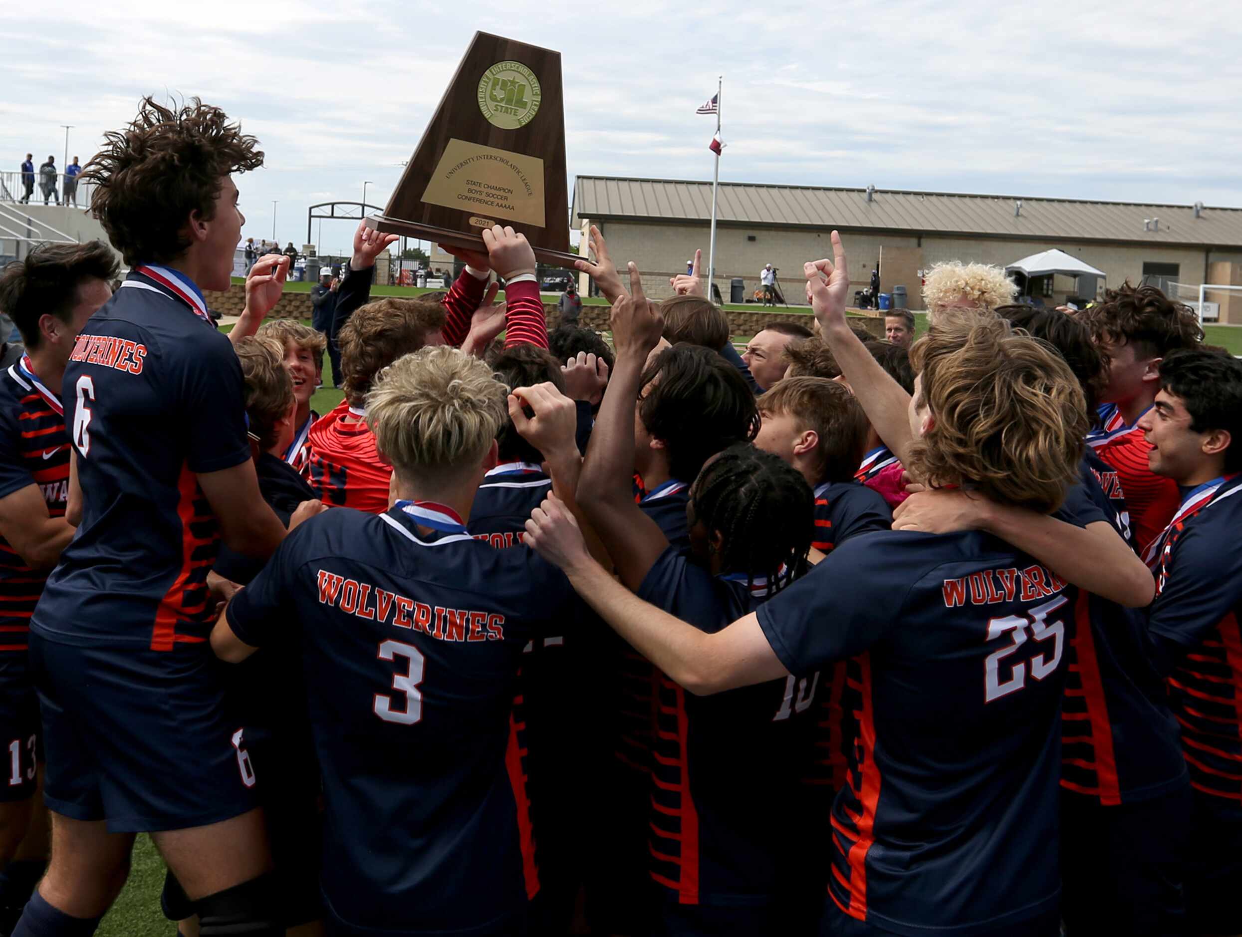 Frisco Wakeland players celebrate after their UIL 5A boys State championship soccer game...