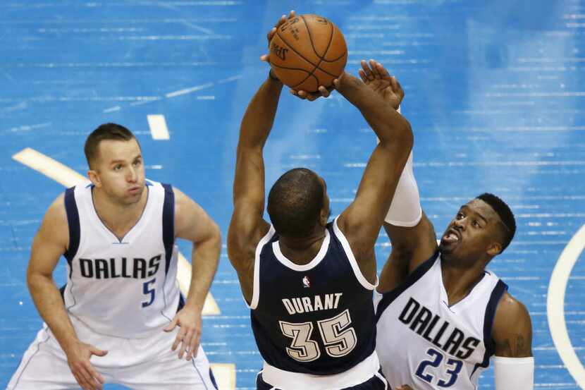 Oklahoma City Thunder forward Kevin Durant (35) shoots over Dallas Mavericks guard Wesley...
