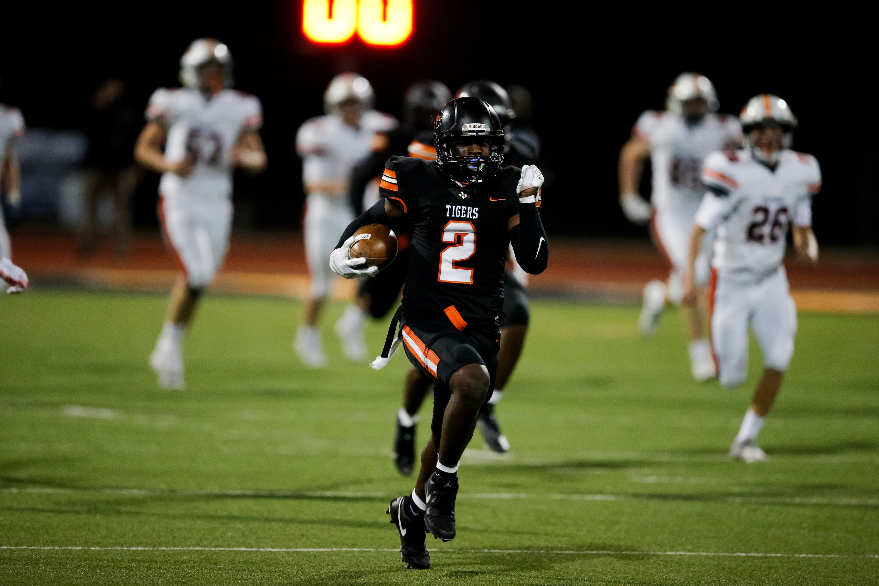 Lancaster senior defensive back Davion Hodge (2) returns a blocked field goal attempt by...