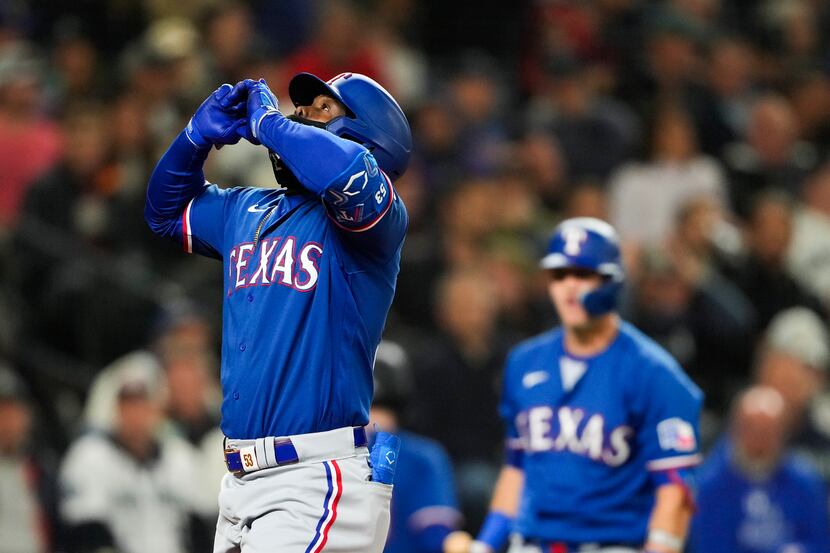 Rangers clinch playoff berth, tie for division lead