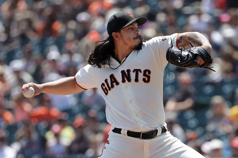 San Francisco Giants pitcher Dereck Rodriguez throws against the Pittsburgh Pirates during...