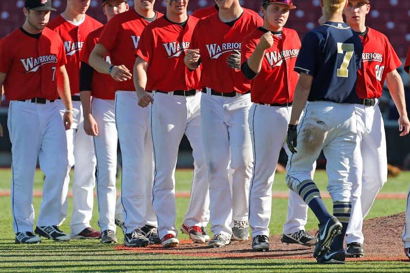 Keller's Brad Gneiting congratulates a host of Martin players on their 5-1 series-clinching...