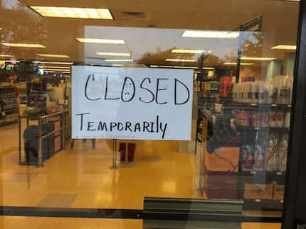 The sign displayed Tuesday, Oct. 29, on the door of Spec's Wines, Spirits & Finer Foods at...