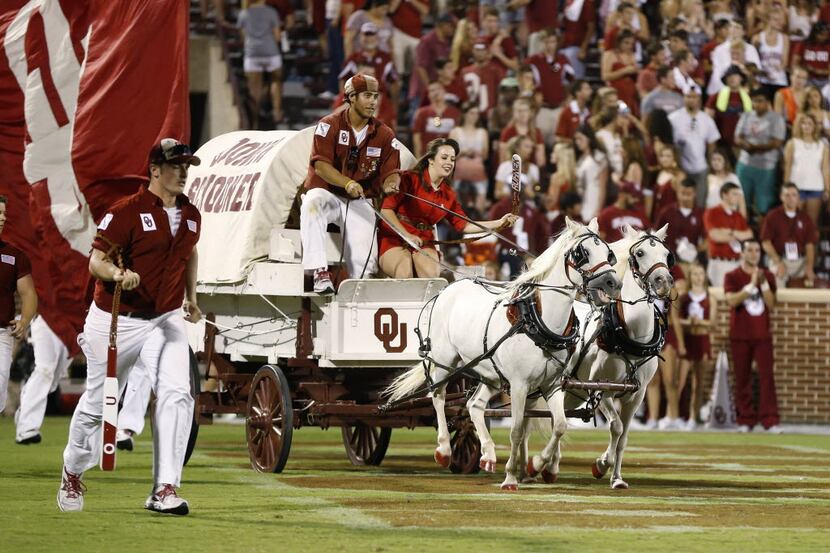 The Oklahoma Sooner Schooner is driven out onto the field following an Oklahoma touchdown...