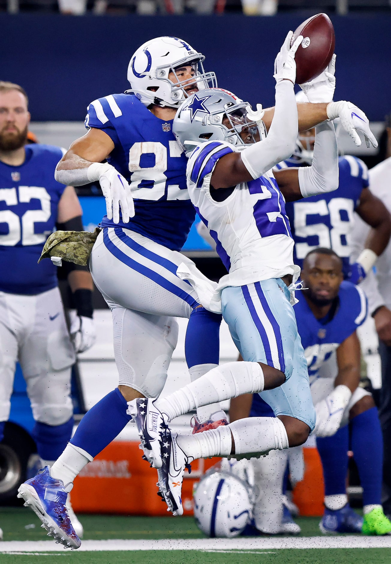 Dallas Cowboys cornerback DaRon Bland (26) intercepts the ball on a pass intended for...