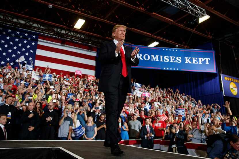 President Donald Trump arrives to speak during a rally at the Four Seasons Arena at Montana...