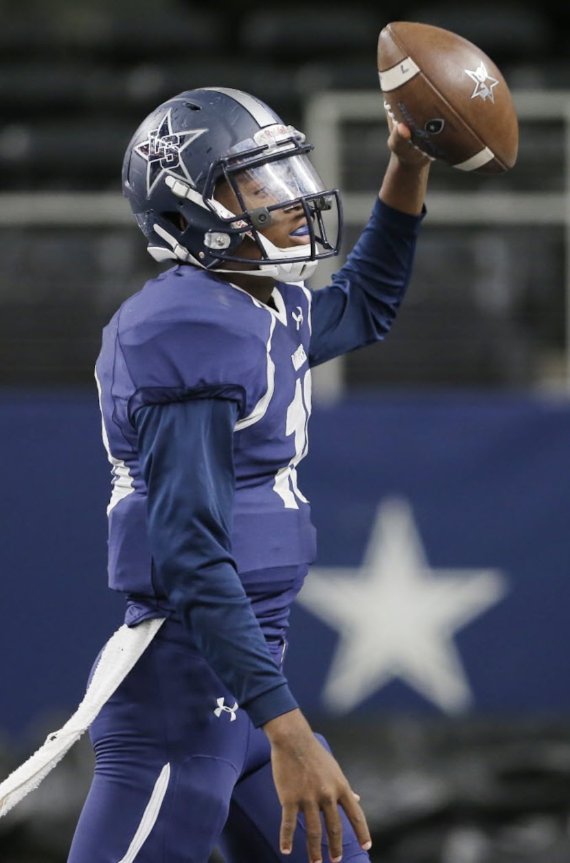 TXHSFB Frisco Lone Star quarterback Jason Shelley (18) celebrates scoring a touchdown on a...