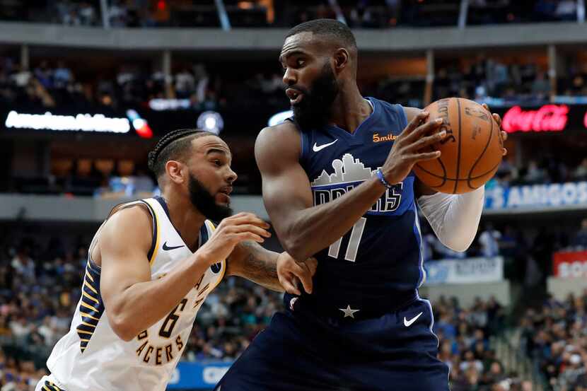 Indiana Pacers guard Cory Joseph (6) defends as Dallas Mavericks guard Tim Hardaway Jr. (11)...