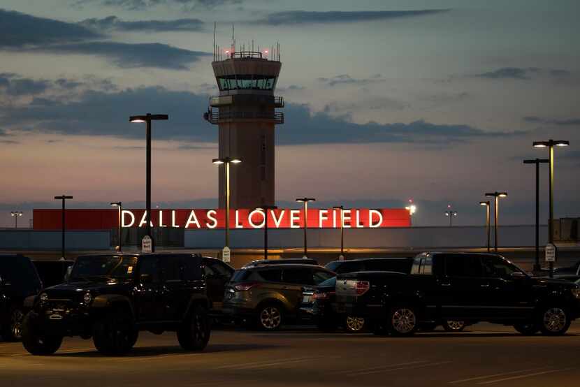 The air traffic control tower and parking lot at Love Field. 