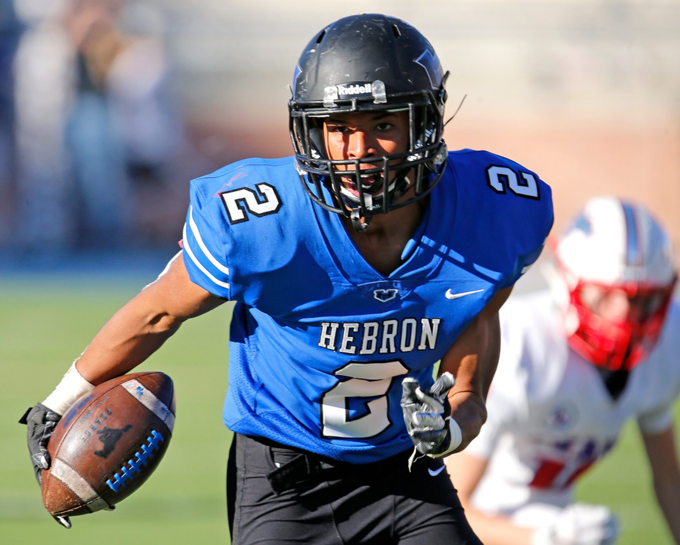 Hebron High School defensive back Diego Johnson (2) jumped the route, made the interception...