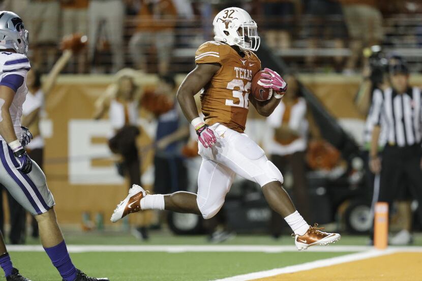 Texas' Johnathan Gray (32) scores against Kansas State during the third quarter of an NCAA...