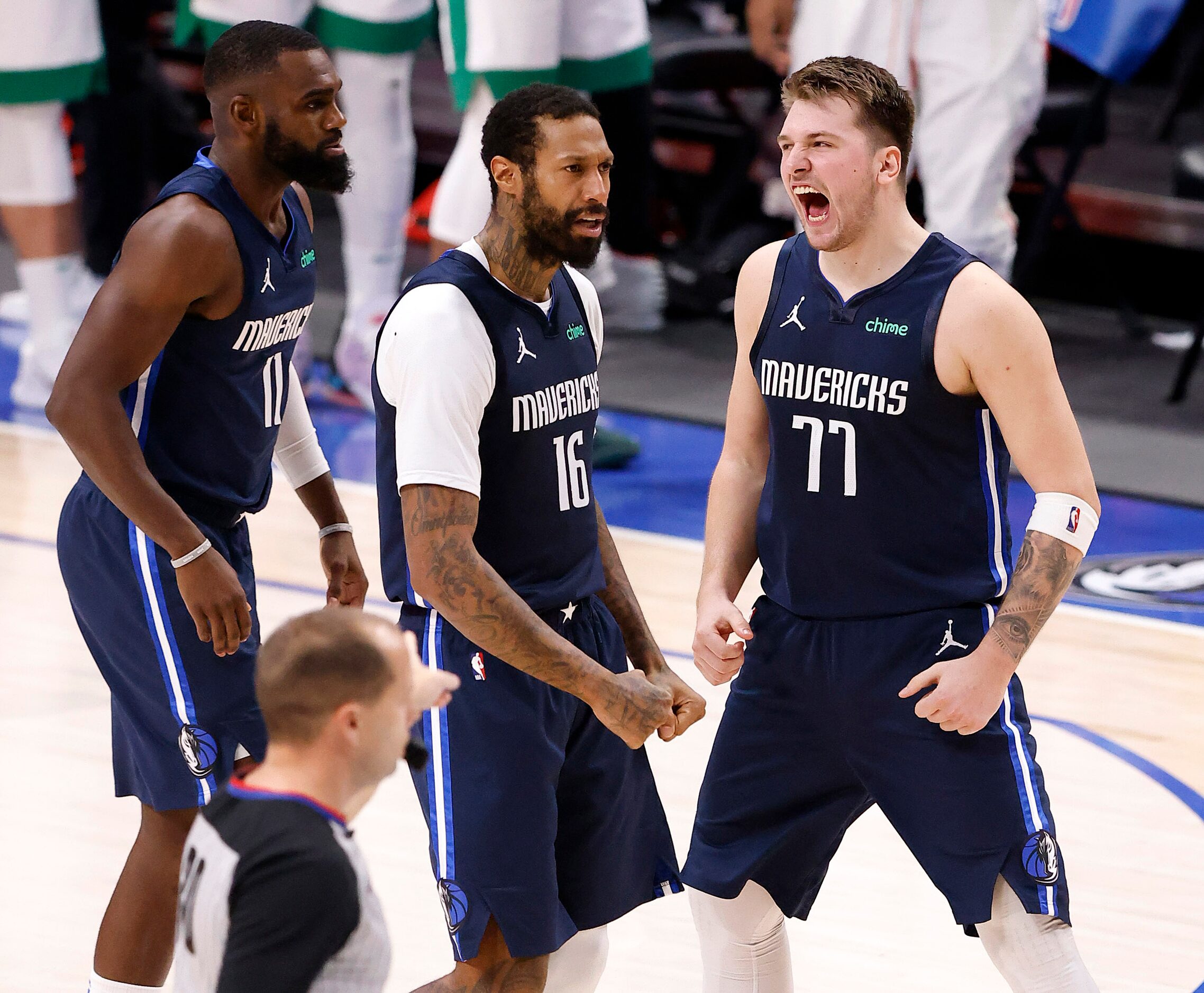 Dallas Mavericks guard Luka Doncic (77) celebrates his game-winning shot with forward James...