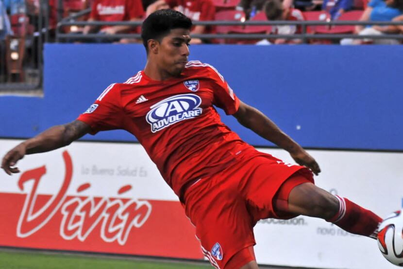 FC Dallas' Moises Hernandez (3) keeps the ball in play against Aston Villa during a friendly...